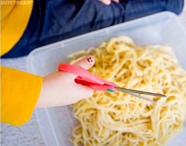 Learn Fine Motor Skills with Spaghetti Cutting